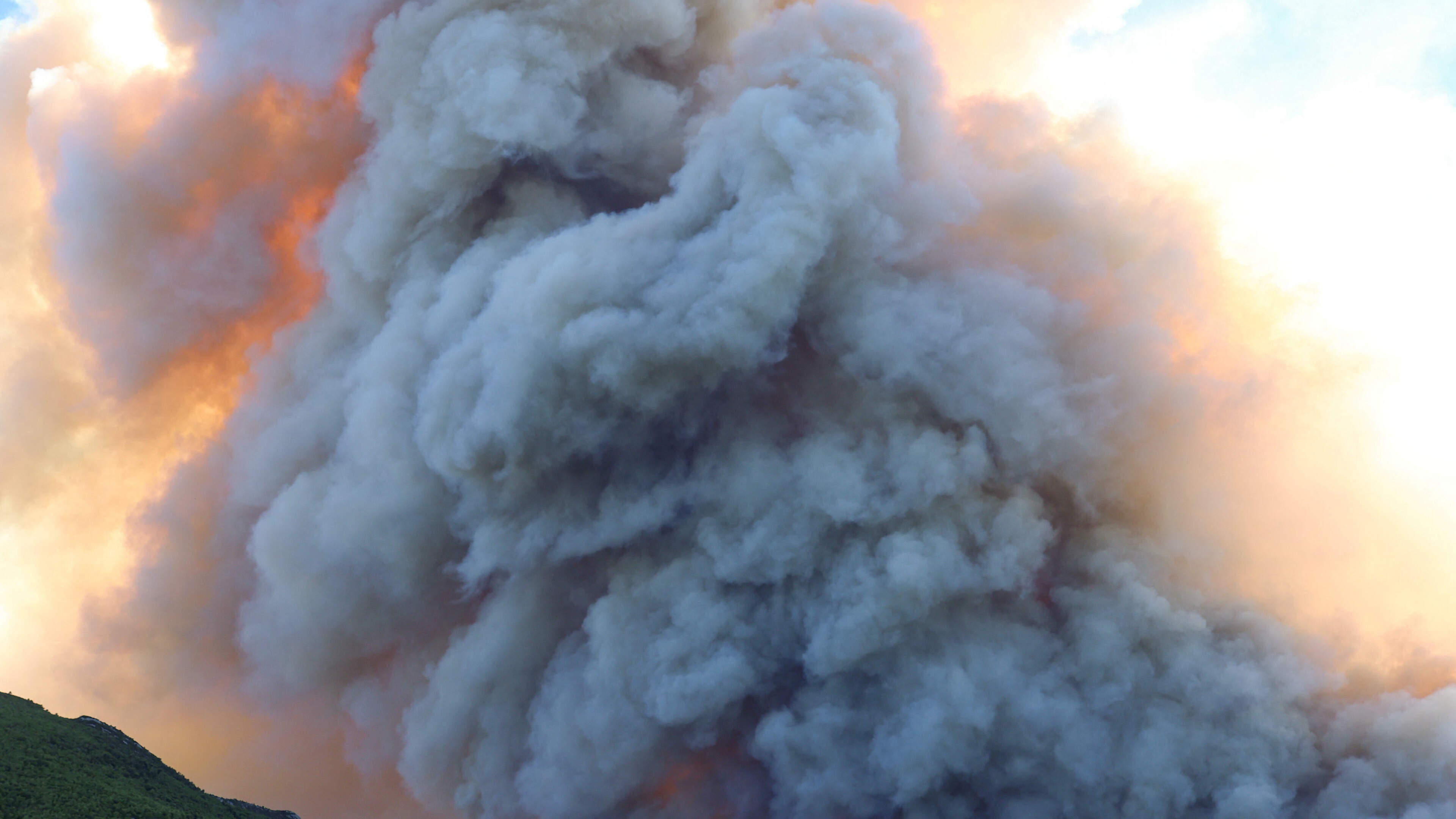 Wildfires rage in Greece as firefighters continue battle in France and Spain