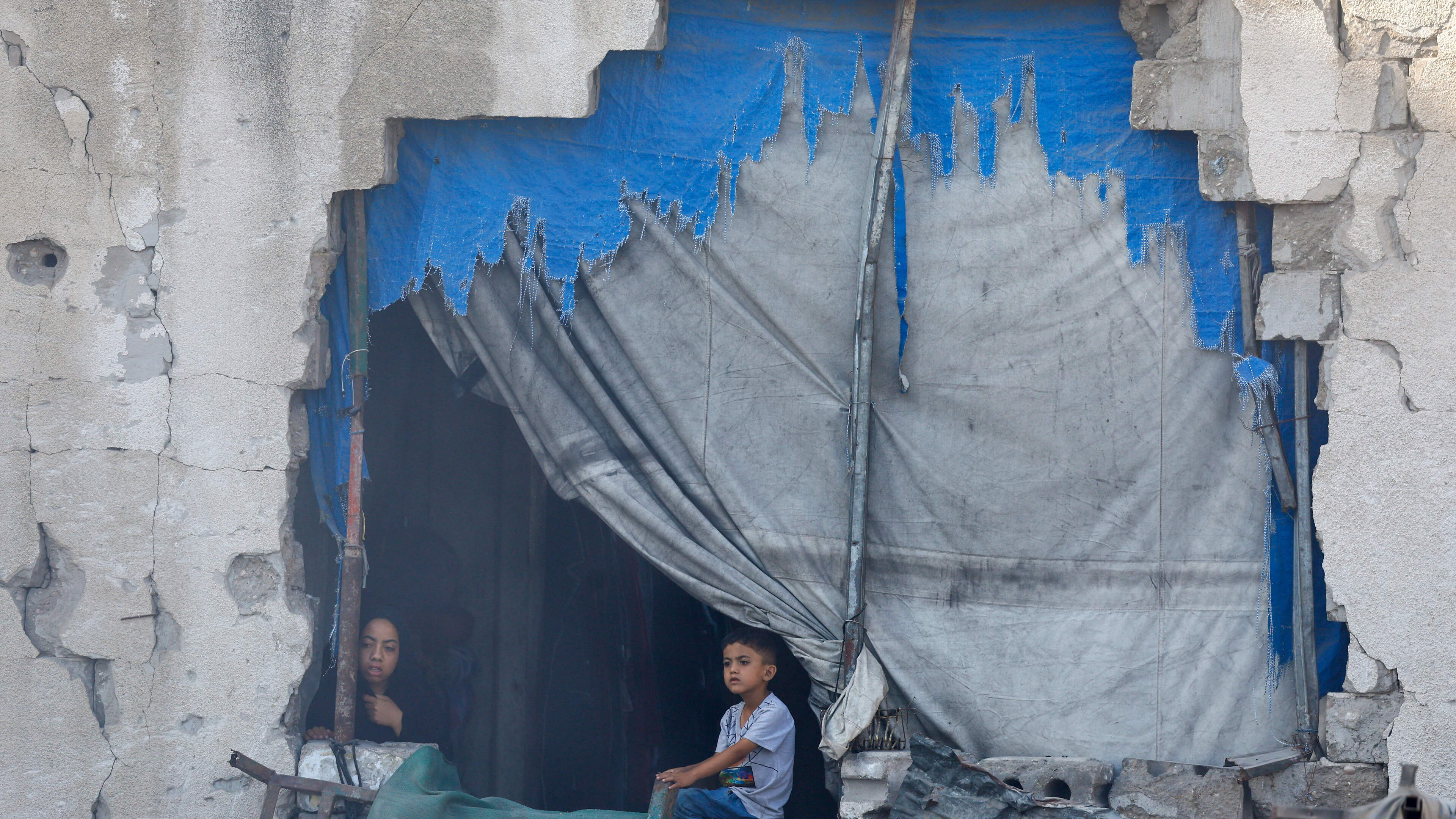 War-damaged Gaza building collapses killing 12 people seeking shelter inside
