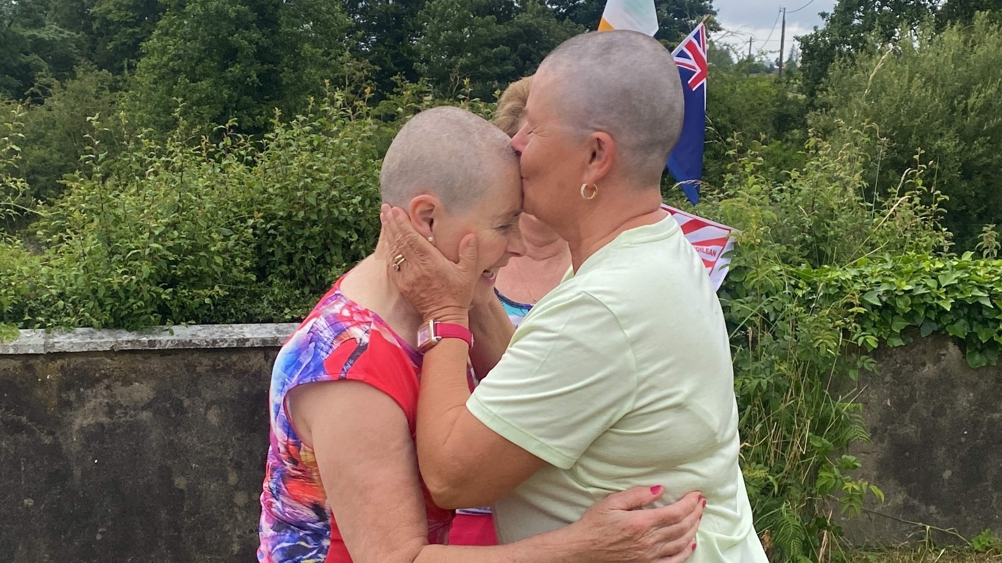 Limerick sisters stunned as head shave fundraiser for UHL cancer services rockets past target