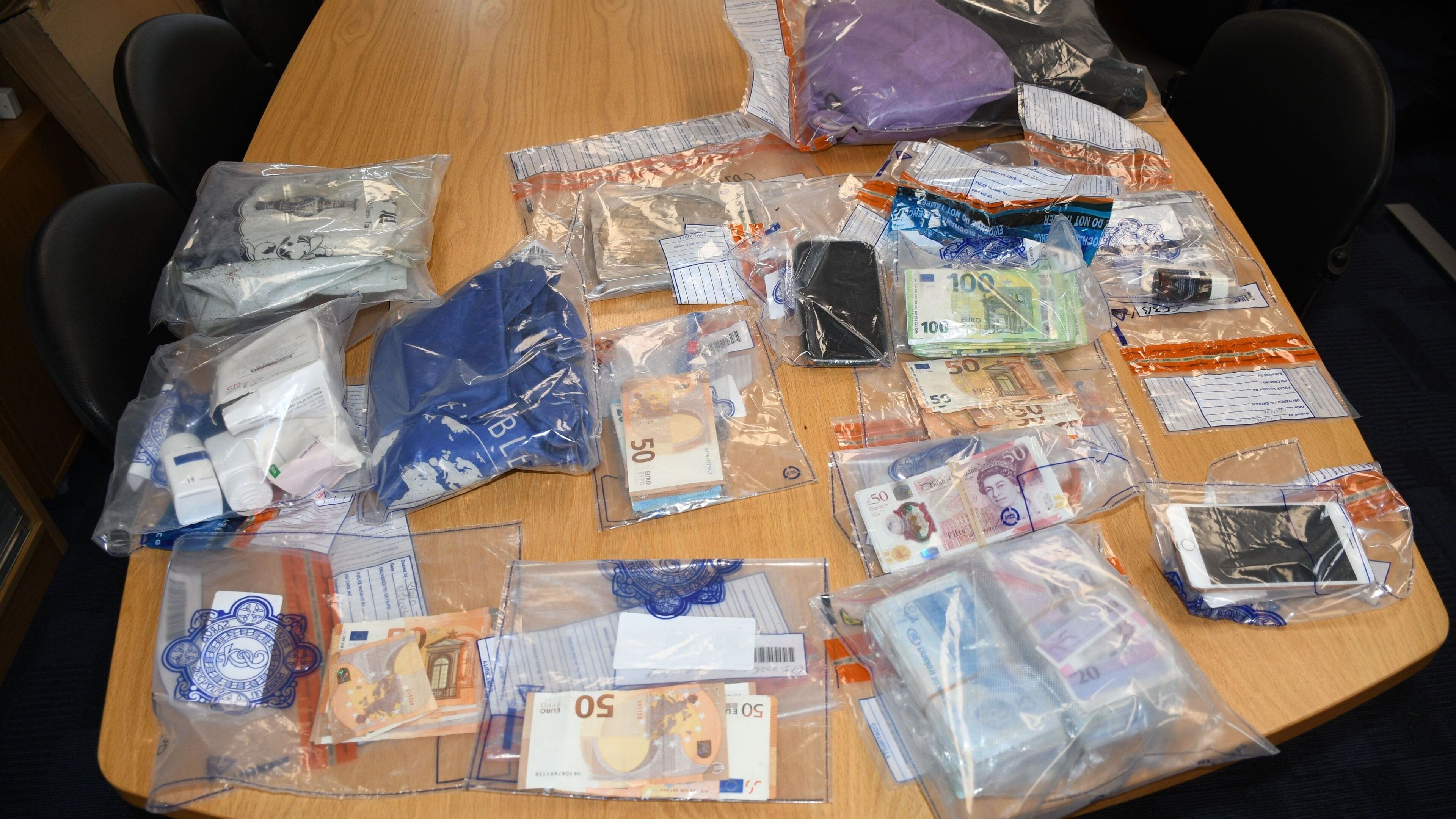 Drugs and cash seized as cross-border operation targets suspected organised crime gang