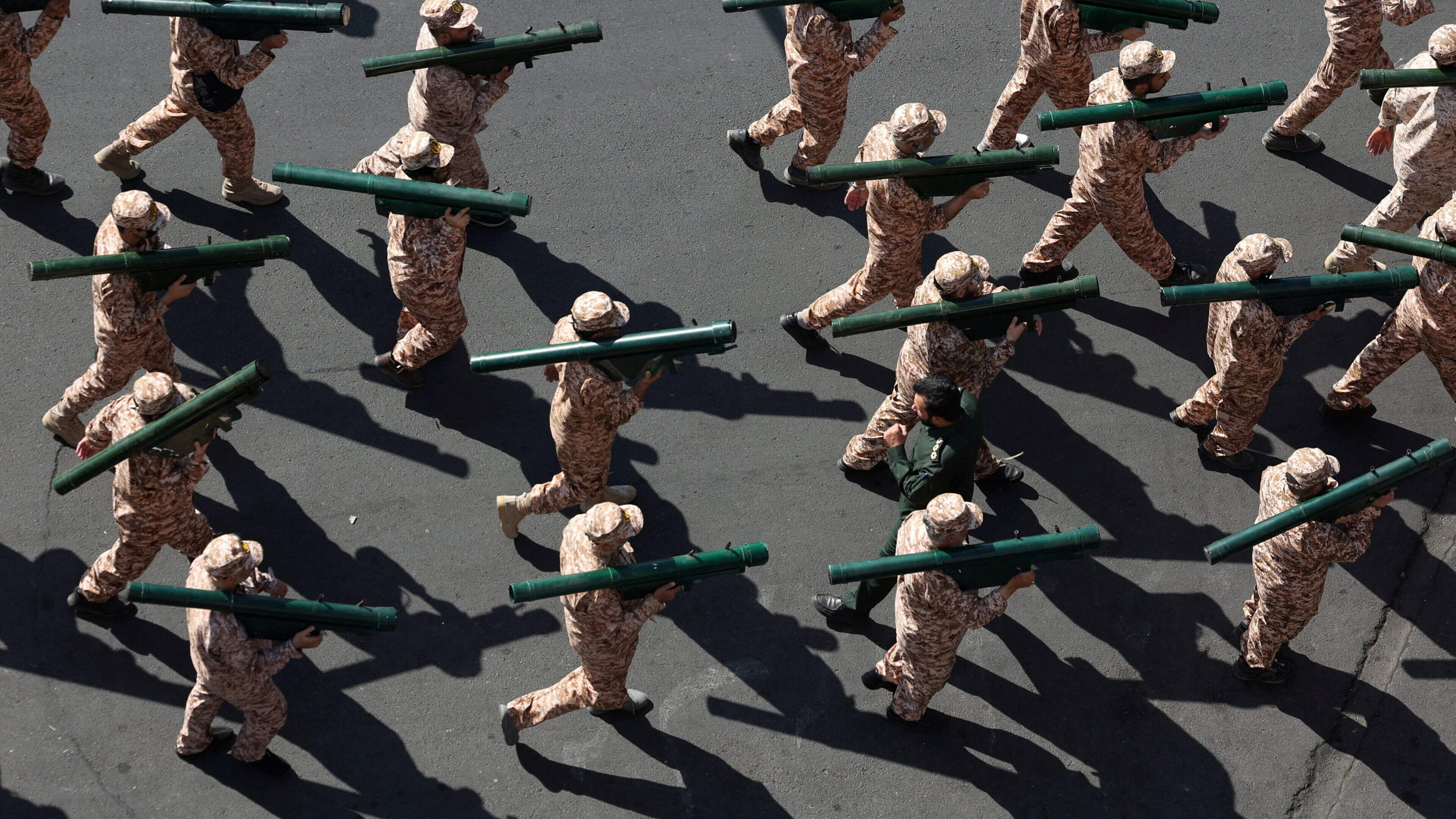 Iran holds march in defiance of latest threats by Donald Trump