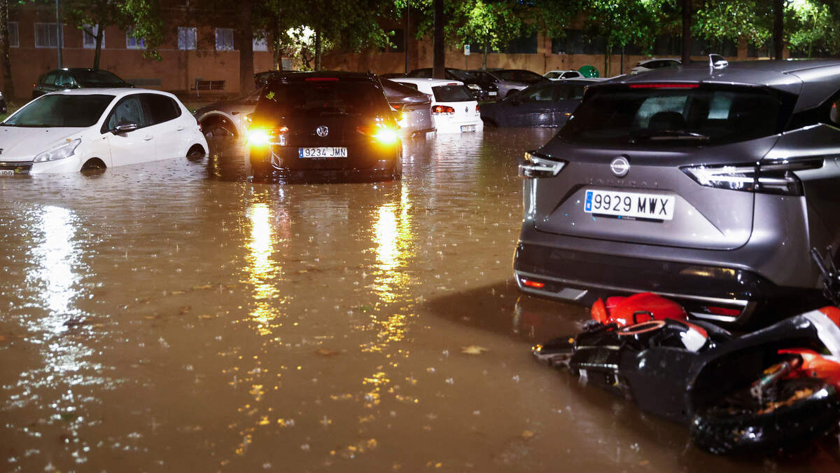 Heavy rain floods streets after weather alert in Spanish city of Valencia