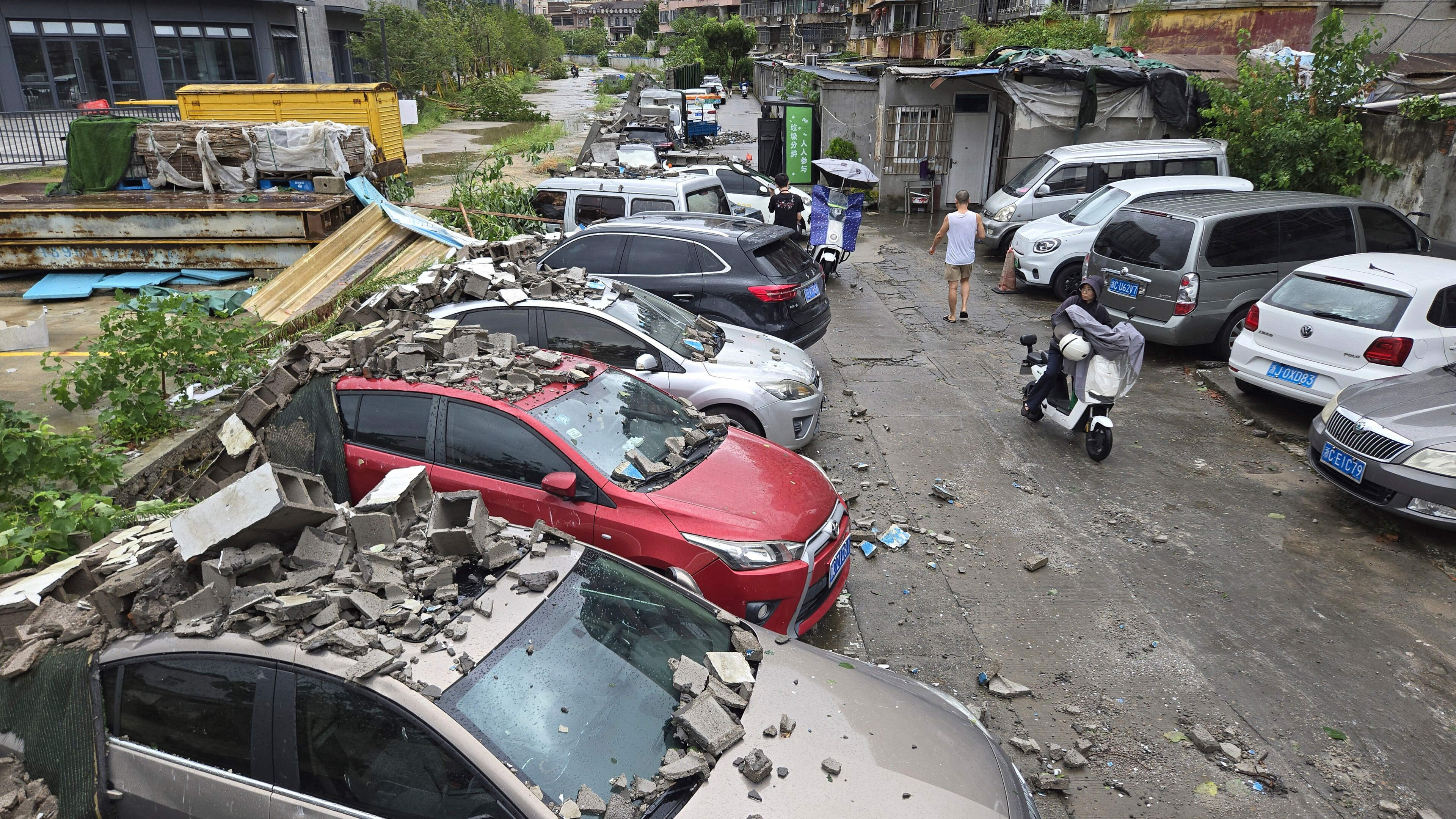 Storms from Typhoon Dolphin soak China's east and ground nearly 950 Shanghai flights