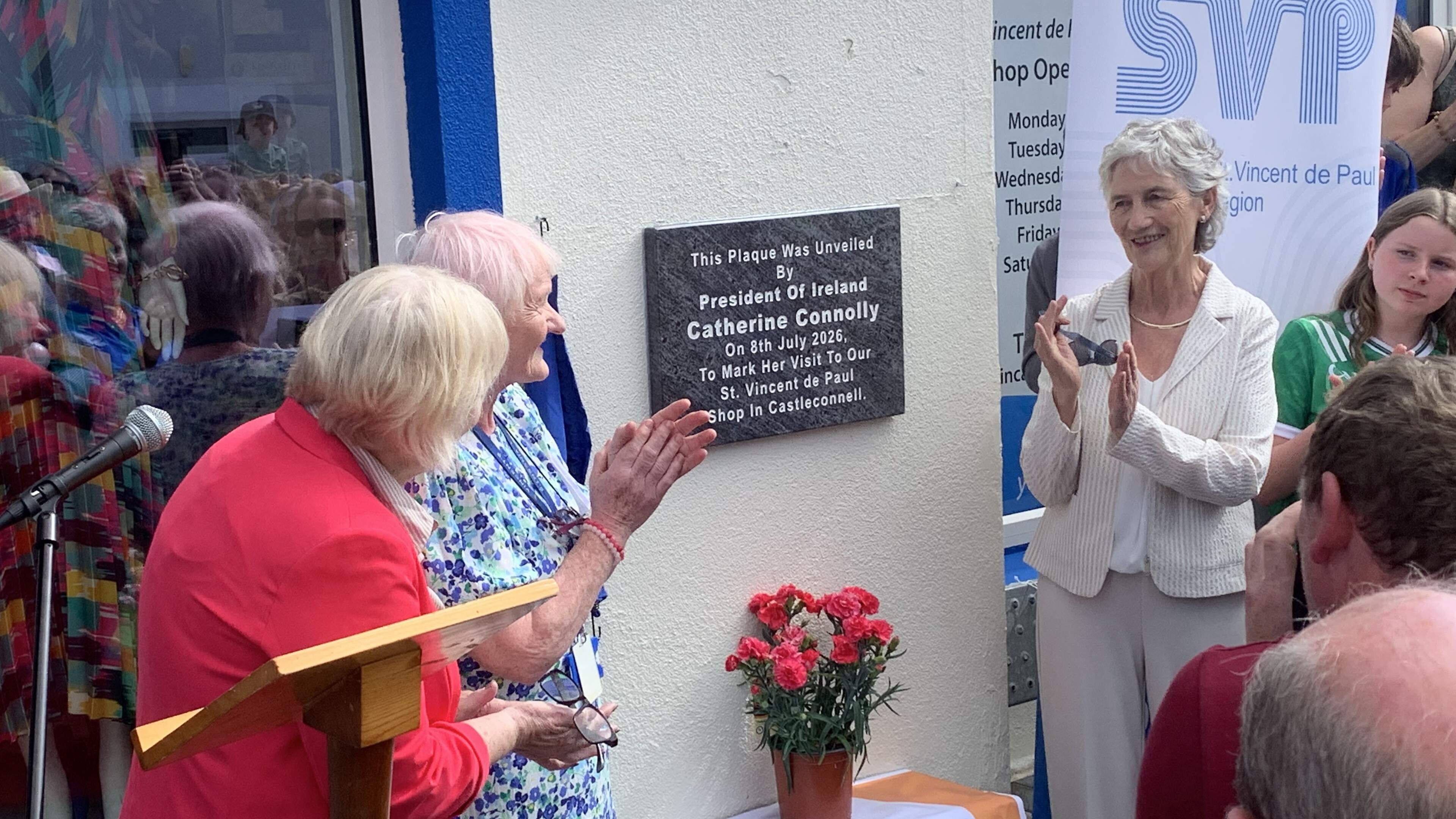 President Connolly receives warm Limerick welcome as beloved charity shop reopens