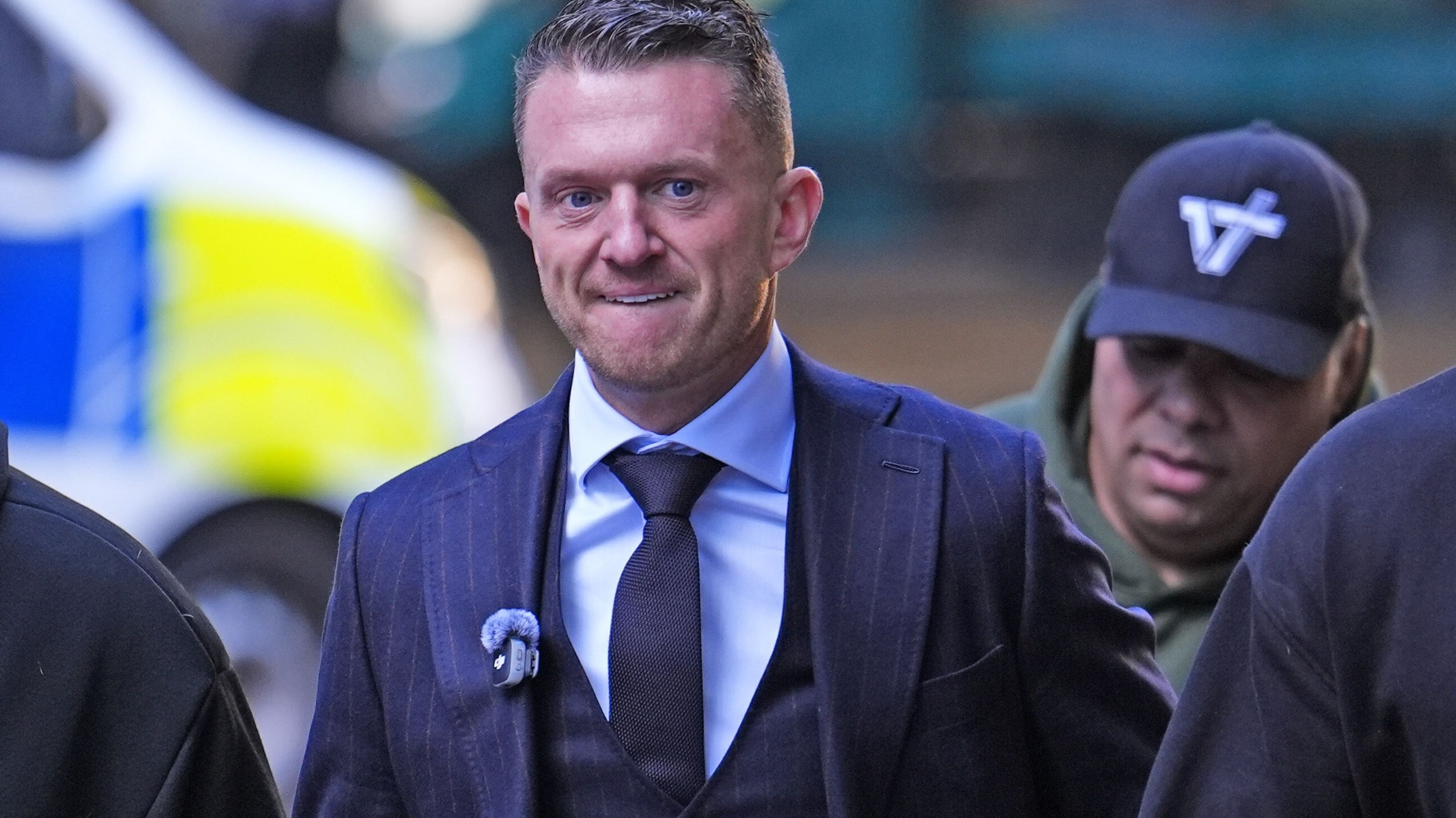 Tommy Robinson appears at crown court over alleged harassment of two journalists