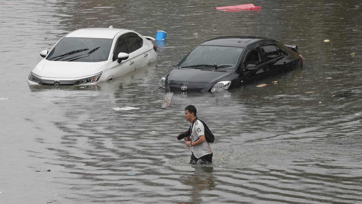 Bangkok declares flooding disaster as residents urged to stay at home