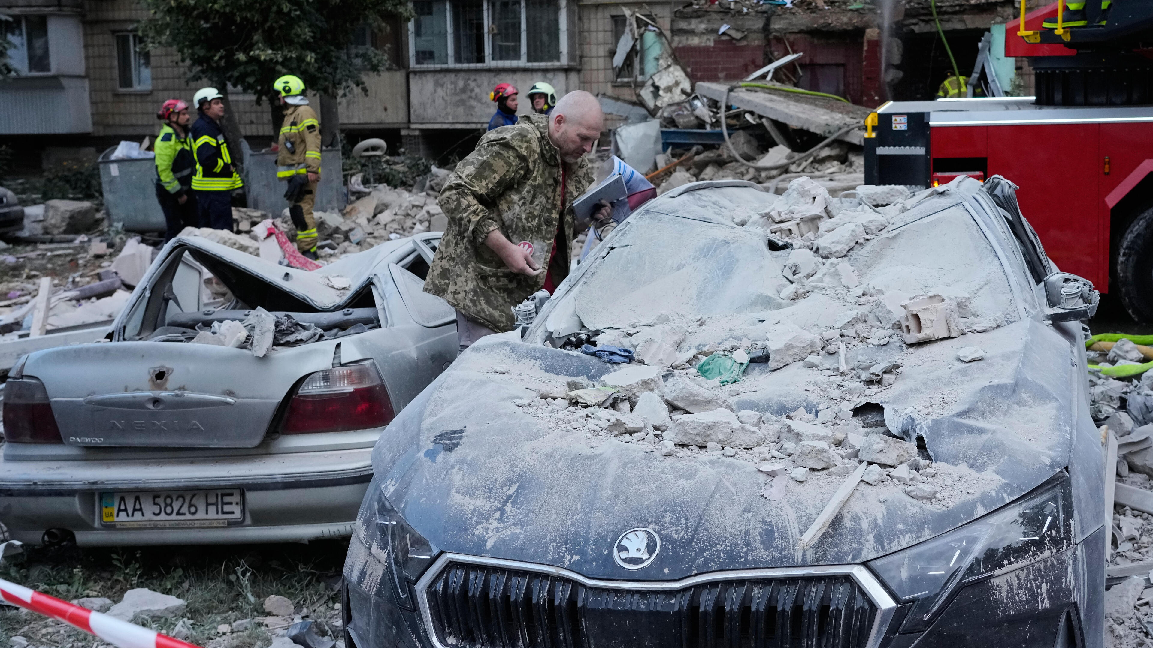 At least 10 dead as Kyiv hit with ballistic missiles hours after Zelensky said attack ‘imminent’